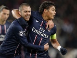 PSG defender Thiago Silva is congratulated by Jeremy Menez after a goal on December 4, 2012