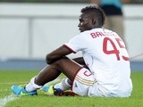 Milan's Mario Balotelli sits dejected after defeat to Verona on August 24, 2013