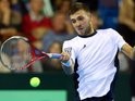 Dan Evans in action for the British Davis Cup team.