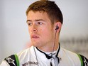 Force India's Scottish driver Paul di Resta stands in the pits during the first practice session at the Spa-Francorchamps circuit in Spa on August 23, 2013