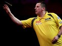 Dave Chisnall of England in action during his second round match on day eight of the 2013 Ladbrokes.com World Darts Championship at the Alexandra Palace on December 21, 2012