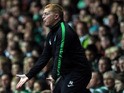 Celtic's Northern Irish manager Neil Lennon reacts during the UEFA Champions League Group H football match between Celtic and Ajax at Celtic Park in Glasgow, Scotland, on October 22, 2013