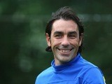 Robert Pires looks on during an Arsenal training session at London Colney on September 30, 2013