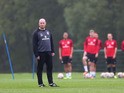 John Hartson assistant coach looks on during the Wales training session at the Vale of Glamorgan complex on October 8, 2013