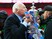 Wigan chairman Dave Whelan kisses the trophy following his team's 1-0 victory during the FA Cup with Budweiser Final between Manchester City and Wigan Athletic at Wembley Stadium on May 11, 2013