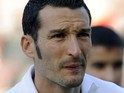 Italy's defender Gianluca Zambrotta listens to the national anthems ahead of the friendly football match match Italy vs Mexico at the Heizel stadium in Brussels on June 3, 2010