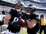 Zach Ertz #86 of the Philadelphia Eagles celebrates his touchdown with teammate James Casey #85 in the first quarter against the Arizona Cardinals on December 1, 2013