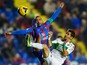 Juanfran Garcia of Levante UD competes for the ball with Ferran Corominas of Elche FC during the La Liga match between Levante UD and Elche FC at Ciutat de Valencia on December 13, 2013