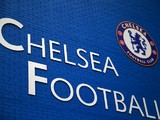 Chelsea badge is seen on a blue wall ahead of the Barclays Premier League match between Chelsea and Swansea City at Stamford Bridge on December 26, 2013