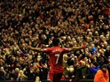 Liverpool's Uruguayan striker Luis Suarez celebrates scoring their second goal during the English Premier League football match between Liverpool and Hull City at Anfield in Liverpool, northwest England, on January 1, 2014