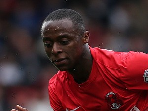 Moses Odubajo of Leyton Orient keeps his eye on the ball during the Sky Bet League One match between Leyton Orient and MK Dons at The Matchroom Stadium on October 12, 2013