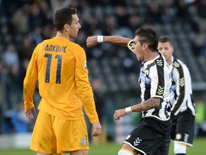 Roberto Pereyra of Udinese Calcio celebrates after scoring their first goal during the Serie A match between Udinese Calcio and Hellas Verona FC at Stadio Friuli on January 6, 2014