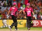 Moises Henriques and Nic Maddinson of the Sixers celebrate winning the Big Bash League match between Sydney Thunder and the Sydney Sixers at ANZ Stadium on January 25, 2014