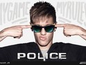 Brazilian football player Neymar poses in Police sunglasses as part of their new 2014 eyewear campaign