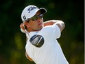 Adam Scott of Australia plays a shot during the third round of the Sony Open in Hawaii at Waialae Country Club on January 11, 2014