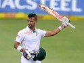 JP Duminy of South Africa celebrates his 100 during day 2 of the 2nd Test match between South Africa and Australia at AXXESS St Georges on February 21, 2014