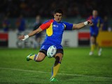 Florin Vlaicu of Romania clears the ball downfield during the IRB 2011 Rugby World Cup Pool B match between Georgia and Romania at Arena Manawatu on September 28, 2011