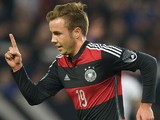 Germany's midfielder Mario Gotze celebrates after he scored during the International friendly football match Germany vs Chile in Stuttgart, southwestern Germany, on March 5, 2014