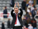 David Moyes manager of Manchester United applauds the fans during the Barclays Premier League match between Newcastle United and Manchester United at St James' Park on April 5, 2014