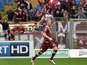Torino's Jasmin Kurtic celebrates after scoring his team's first goal against Lazio during the Serie A match on April 19, 2014