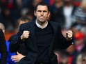 Gustavo Poyet the Sunderland manager celebrates his team's 1-0 victory during the Barclays Premier League match between Manchester United and Sunderland at Old Trafford on May 3, 2014