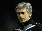 Alan Irvine, then in charge of Sheffield Wednesday, looks on during a Championship game on March 24, 2010