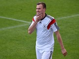 Germany's defender Kevin Grosskreutz reacts during a training game of the German national football team and the under 20 German national team at the training ground in San Martino in Passiria, Italy, on May 25, 2014