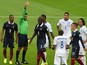 Honduras' midfielder Wilson Palacios receives a red card from Brazilian referee Sandro Meira Ricci during a Group E football match between France and Honduras at the Beira-Rio Stadium in Porto Alegre during the 2014 FIFA World Cup on June 15, 2014