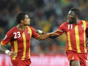 Ghana's midfielder Sulley Muntari (C) celebrates with Ghana's striker Kevin-Prince Boateng celebrate during the 2010 World Cup QF match on July 2, 2010