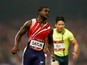 Justin Gatlin of the United States crosses the finishing line during 2014 IAAF Beijing Challenge at National Sports Center on May 21, 2014