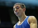 A bloody Michael Conlan of Northern Ireland after his first bout on July 25, 2014