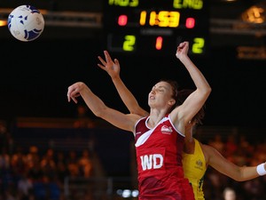 Jade Clarke of England is challanged by her opponent in the Pool B netball match between Australia and England at SECC Precinct during day three of the Glasgow 2014 Commonwealth Games on July 26, 2014