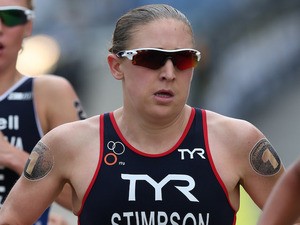 Jodie Stimpson of Great Britain in action during the run leg of the Elite Women's PruHealth World Triathlon Grand Final on May 31, 2014