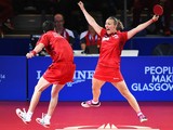 Kelly Sibley and Danny Reed of England celebrate winning the bronze medal following their Mixed Doubles Bronze Medal Match against Jian Zhan and Tianwei Feng of Singapore at Scotstoun Sports Campus during day ten of the Glasgow 2014 Commonwealth Games on 