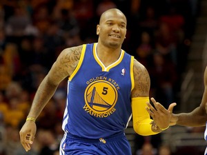 Marreese Speights #5 of the Golden State Warriors reacts after a basket in the third quarter against the Cleveland Cavaliers at Quicken Loans Arena on December 29, 2013