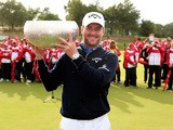 Marc Warren of Scotland poses with the trophy after winning Made In Denmark at Himmerland Golf & Spa Resort on August 17, 2014