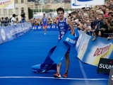 Britain's Jonathan Brownlee crosses the finish line to win the sixth round of the ITU World Triathlon Series, an Intermediate distance race (1,5 km swim, 40 km bike and 10 km run), in Stockholm on August 25, 2012