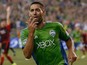 Clint Dempsey #2 of the Seattle Sounders reacts after scoring a goal in the second half against the Portland Timbers at CenturyLink Field on July 13, 2014