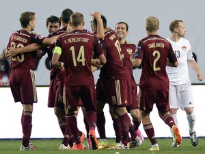 Russian players celebrate after scoring during the UEFA Euro 2016 qualifying football match between Russia and Liechtenstein in Moscow on September 8, 2014