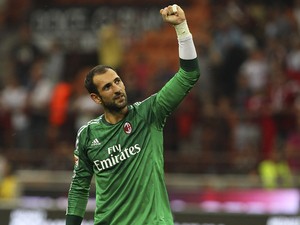 Diego Lopez of AC Milan celebrates a victory at the end of the Serie A match between AC Milan and SS Lazio at Stadio Giuseppe Meazza on August 31, 2014