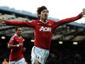 Ji-Sung Park of Manchester United celebrates scoring the opening goal during the Barclays Premier League match between Manchester United and Wolverhampton Wanderers at Old Trafford on November 6, 2010 