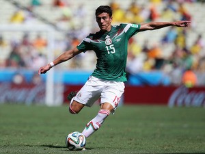 Hector Moreno of Mexico in action during the 2014 FIFA World Cup Brazil Round of 16 match between Netherlands and Mexico at Castelao on June 29, 2014 