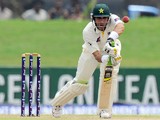 Pakistan cricket team captain Misbah-ul-Haq plays a shot during the first day of the opening Test match between Sri Lanka and Pakistan at the Galle International Cricket Stadium in Galle on August 6, 2014