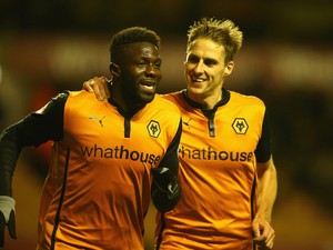 Bakary Sako of Wolverhampton Wanderers celebrates his penalty goal with team mate Dave Edwards during the Sky Bet Championship match on October 21, 2014