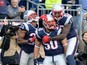 Rob Ninkovich #50 of the New England Patriots reacts with Logan Ryan #26 and Akeem Ayers #52 after recovering a fumble for a touchdown during the second quarter against the Chicago Bears at Gillette Stadium on October 26, 2014