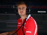 Will Stevens of Marussia looks on from the pit wall during practice for the Japanese Formula One Grand Prix at Suzuka Circuit on October 3, 2014