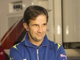 Davide Brivio of Italy and Suzuki Test Team speaks with journalist in paddock during the MotoGP of Valencia - Previews at Ricardo Tormo Circuit on November 6, 2014