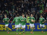 Saint-Etienne's Dutch forward Ricky Van Wolfswinkel celebrates with his teamates after scoring an equalizer during the UEFA Europa League Group F football match AS Saint-Etienne (ASSE) vs FK Qarabag Agdam on November 27, 2014