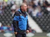 Ally McCoist, the Rangers manager, looks on during the pre season friendly match between Derby County and Rangers at iPro Stadium on August 2, 2014