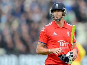 England's Kevin Pietersen leaves the pitch after losing his wicket for 6 runs during the third one day international (ODI) cricket match between England and Australia at Edgbaston cricket ground in Birmingham, central England on September 11, 2013